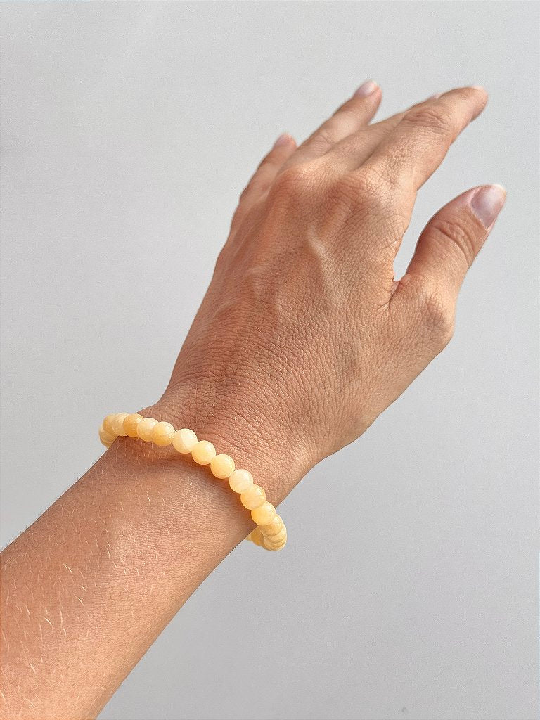 Pulseira de Calcita Amarela Redonda 6mm - Movimento, Realizações, Alegria e Entusiasmo