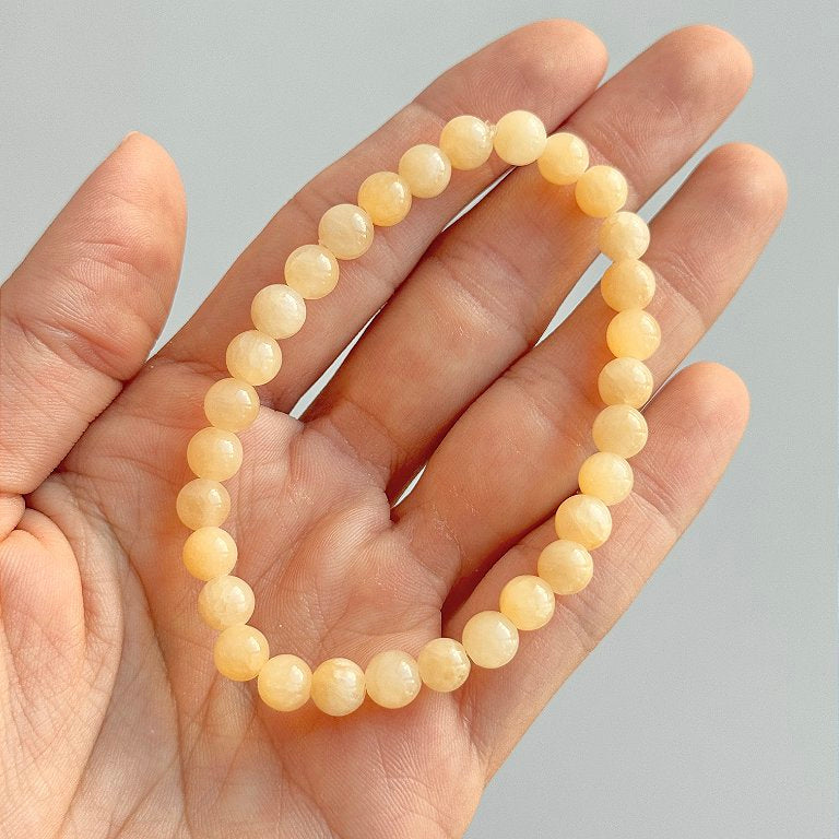 Pulseira de Calcita Amarela Redonda 6mm - Movimento, Realizações, Alegria e Entusiasmo