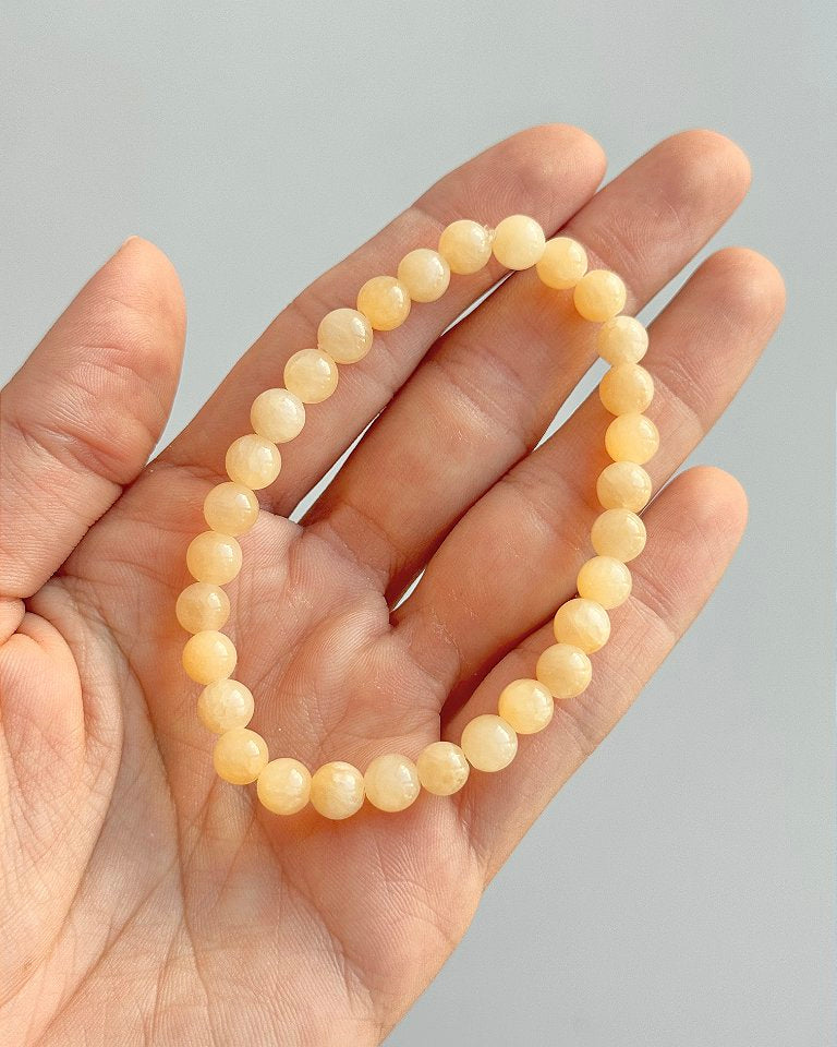 Pulseira de Calcita Amarela Redonda 6mm - Movimento, Realizações, Alegria e Entusiasmo