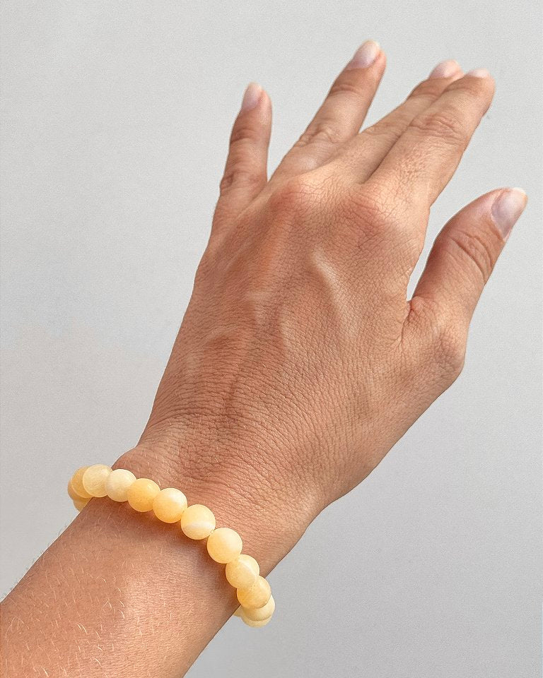 Pulseira de Calcita Amarela Redonda 8mm - Movimento, Realizações, Alegria e Entusiasmo